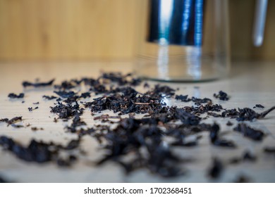 Dried Tea Leaf lying on a table.