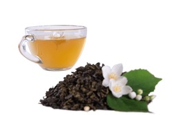Dried Tea Leaves, Fresh Jasmine Blossoms With Green Leaf And Glass Tea Cup Showcased In Isolation Against White Backdrop