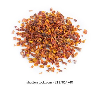 Dried Tomato Flakes In Heap Or Pile In Bright, Cheery Colors Of Orange And Red Isolated On White