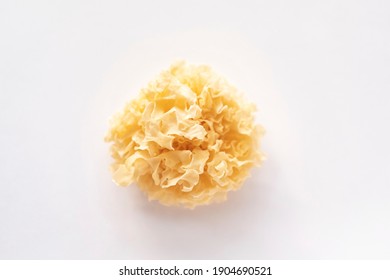 Dried Tremella on a white background，Drug food homology
