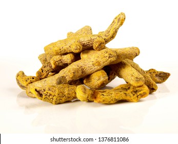 Dried Tumeric Root On White Background