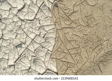 Dried And Wet Cracked Silt Soil, Textured.