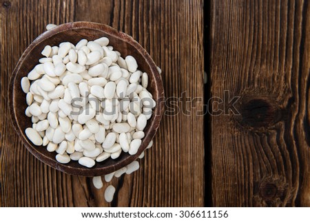 Dried White Beans (close-up shot) on wooden background Stock foto © 