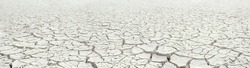 Dried White Clay Panorama, Natural Cracked Texture Of Dry Lake Bed With Perspective And Deep Focus