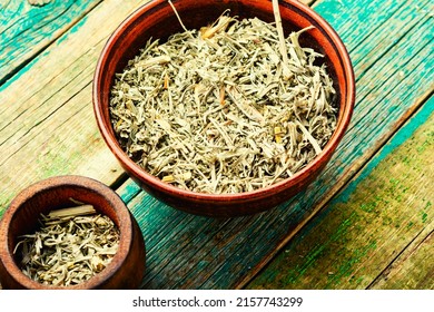Dried wormwood in a bowl. Mugwort homeopathic herbs in herbal medicine.Absinth, cure