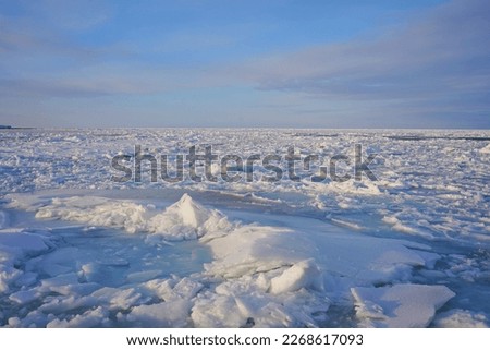 Drift ice can be seen from an icebreaker in Abashiri, Hokkaido, Japan.  The blue sea water refreshes the mind, but the weather is cold.