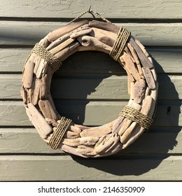 Drift Wood Wreath On Wooden Siding