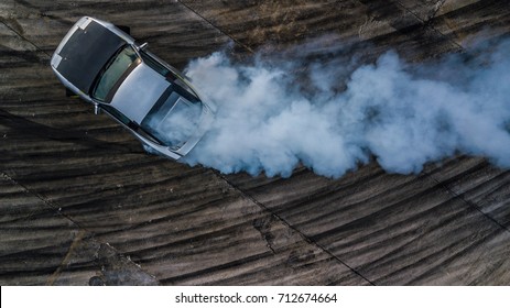 Drifting car, Aerial top view professional driver drifting car on race track, Abstract texture and background black tire tracks skid on asphalt road, Wheel tire tracks background, Car tire track.