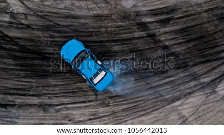 Drifting car, Aerial view professional driver drifting car on race track, Abstract texture and background black tire tracks skid on asphalt road, Wheel tire tracks background, Car tire track skid mark