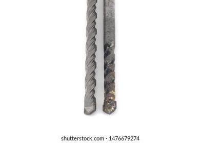 Drill bit for perforator work isolated on white background. Concrete drill worn out. Old and new. 
