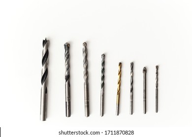 Drill bits for wood and concrete of different sizes isolated