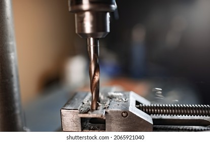 Drill Close-up, Drilling Machine At The Workplace Of A Toolman Locksmith