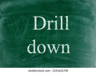 Drill Down Business Phrase Written In Chalk On A Blackboard