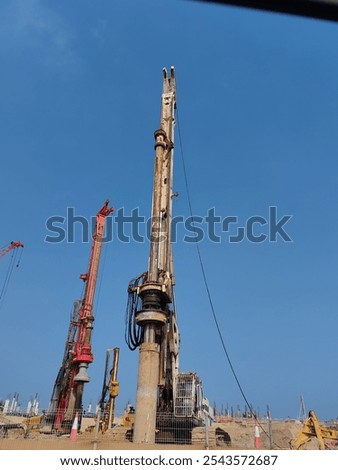 Drill machine, Drilling machine erected on ground for drill having SKY background,Excavator machine on construction site for drill ground hole. Earth drill for digging holes with Tower Crane erected
