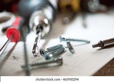 drill new screws are on the table - Shutterstock ID 465950294