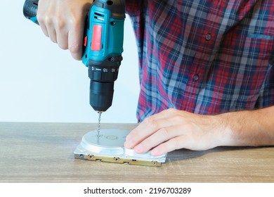 Drilling A Hard Disk Drive To Destroy Evidence Data Close Up. Concept Of Deleting Big Data By Drilling A Hole Into The Harddisk