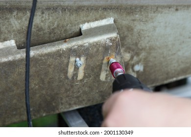 Drilling Holes Before Marine Sonar Ultrasonic Transducer Sensor Mounting On Boat Transom