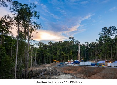 Drilling land rig in oil and gas exploration; location Borneo rain forest