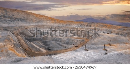 Drilling machine borer installing cast explosives blasting. Banner industry Open coal mine.