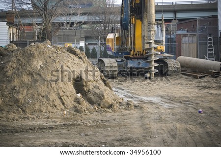  drilling machine on construction site / industrial background