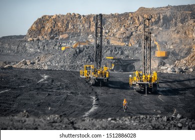 Drilling Machine Rigs Borer Wells For Installing Cast Explosives Blasting. Open Mine Coal And Minerals From Bowels Soil Explosion.