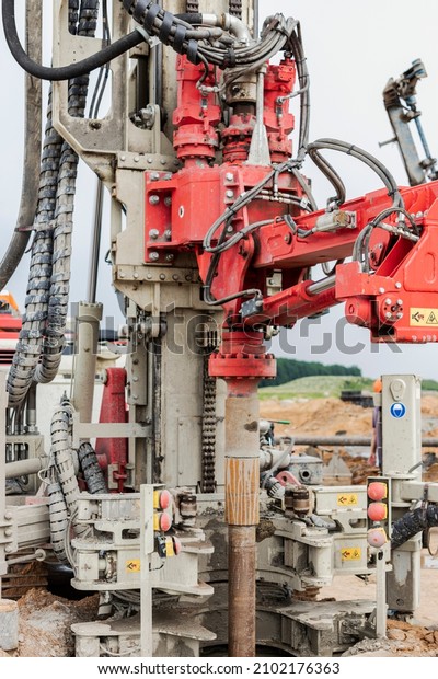 Drilling rig\
close-up at a construction site. Deep hole drilling. Extraction of\
minerals oil and gas. Working\
process