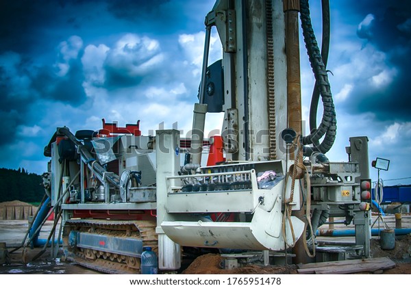 Drilling rig. Drilling deep wells in the\
bowels of the earth. Industry and construction. Mineral exploration\
- oil, gas and other\
resources.
