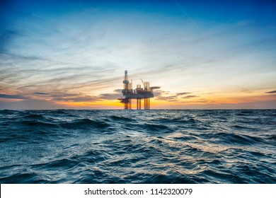 Drilling Rig At Sunset