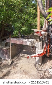 Drilling Rig For Drilling Water Wells And Producing Drinking Water For Residential Premises. Pumping Dirty Water Out Of The Well