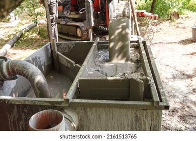 Drilling Rig For Drilling Water Wells And Producing Drinking Water For Residential Premises. Pumping Dirty Water Out Of The Well