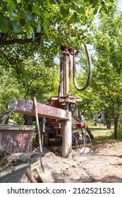 Drilling Rig For Drilling Water Wells And Producing Drinking Water For Residential Premises. Pumping Dirty Water Out Of The Well