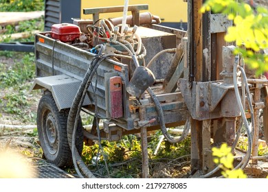 Drilling Rig For Drilling Water Wells And Producing Drinking Water For Residential Premises. Pumping Dirty Water Out Of The Well