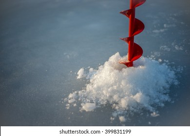 Drilling Through Ice With Ice Auger