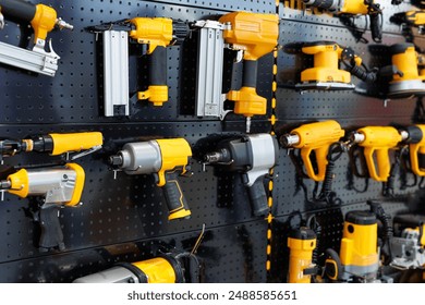 Drills and screwdrivers are sold in the power tool store. Showcase with power tool drills