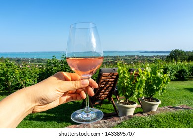 Drining Rose Wine Over Lake Balaton In Csopak Hungary