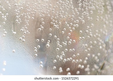 Drink Bubbles: Close Up Of Carbonated Bubbles Inside A Glass Of White Wine Spritzer