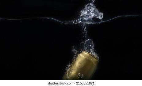 Drink Can Splash Falling Into Water With Black Background, Selective Focus And Copy Space