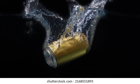 Drink Can Splash Falling Into Water With Black Background, Selective Focus And Copy Space