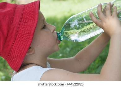To drink clear water . Spring water . Holy water. The child drinks water .The girl drinks water
