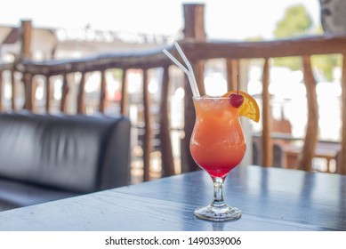 Drink Cocktail Alcohol Sex On The Beach With Cherry Decoration In A Restaurant On The Table