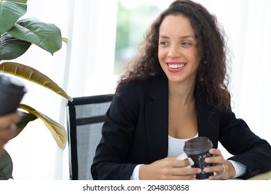 Drink Coffee. Hispanic Business Woman Busy Working Laptop Computer At Office. 