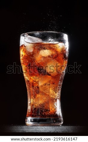 
drink coke cola coca cola glass in black background