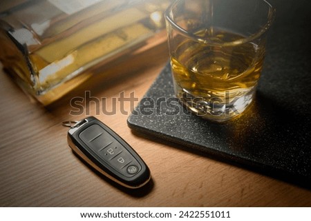Drink and drive, alcoholism with car keys concept