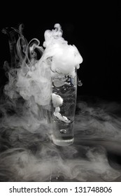 Drink In Glass With The Effect Of Dry Ice