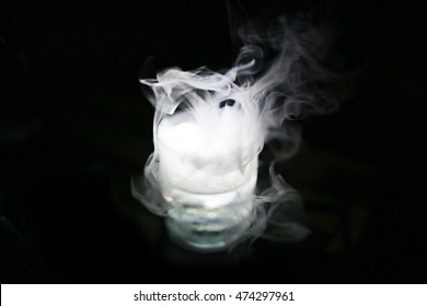 Drink In Glass With The Effect Of Dry Ice

