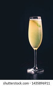 Drink With Lime And Mint In A Champagne Glass