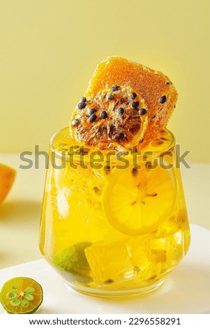 A drink made of passion fruit and lemon, a refreshing drink in summer, with a sweet and sour taste(Passiflora edulis).