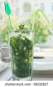 Drink Mojito illuminated by light from the window