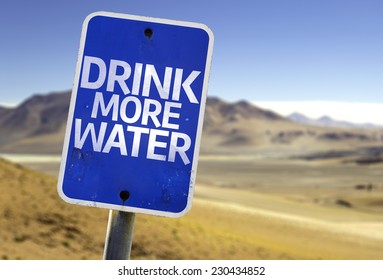 Drink More Water Sign With A Desert Background