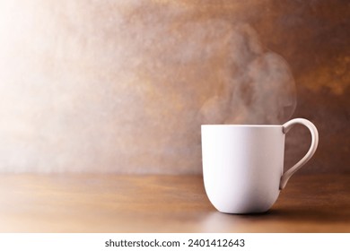 drink, mug with steam escaping from the hot cup. Close-up on brown gradient background, autumn tones, tea, coffee, chocolate, mulled wine, on a vintage table. 
